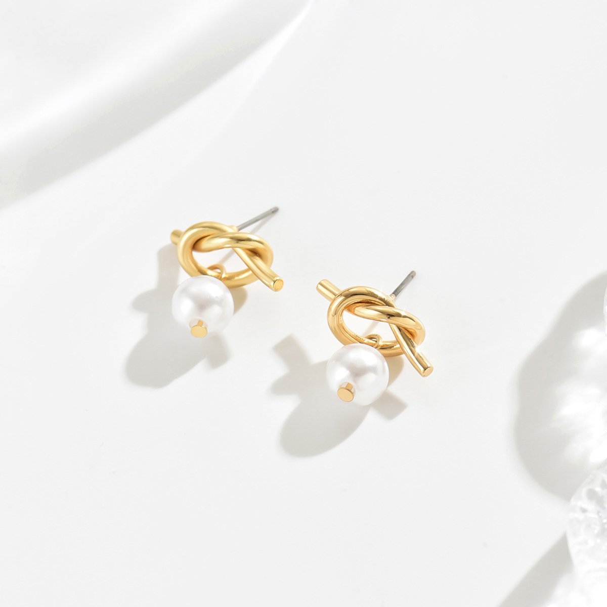 Elegant Gold Knot Stud Earrings With Pearl Drop